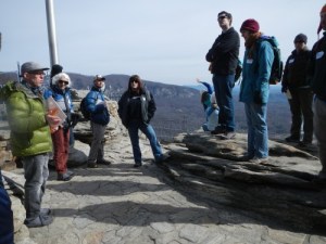Learning about geology (Anthony Love) on top of Chimney Rock, NC